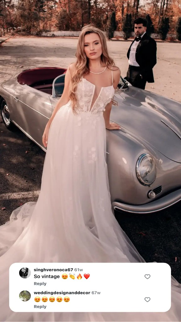 Bridal model with a silver Porsche Speedster in vintage styling